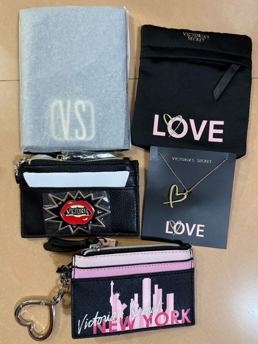 Limited Edition Victoria Secret
Heart Necklace, NYC Card Holder Keychain,